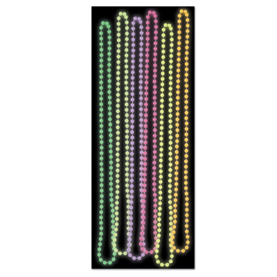 Perles de fête brillantes dans le noir