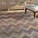 Airionna Hand Tufted Wool/Cotton Chevron Rug in Brown/Beige