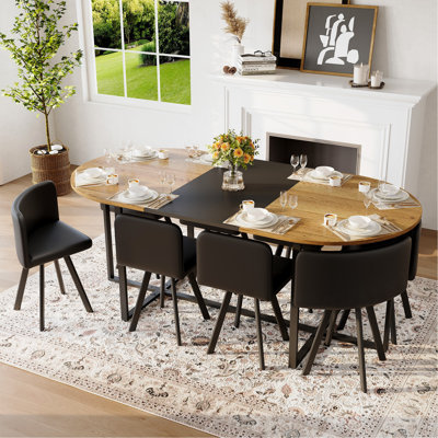 Ensemble de table de salle à manger 9 pièces ovale, plateau de table fixe en deux tons grain de bois et triamine de grain de bois noir avec 8 chaises en cuir de polyuréthane noir, ensemble de table de cuisine moderne pour 8 personnes, idéal pour les réunions de famille