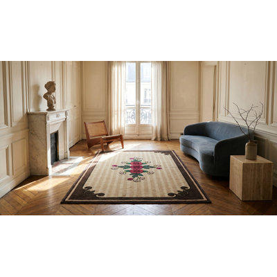 Tapis américain antique à motif floral d'influence européenne