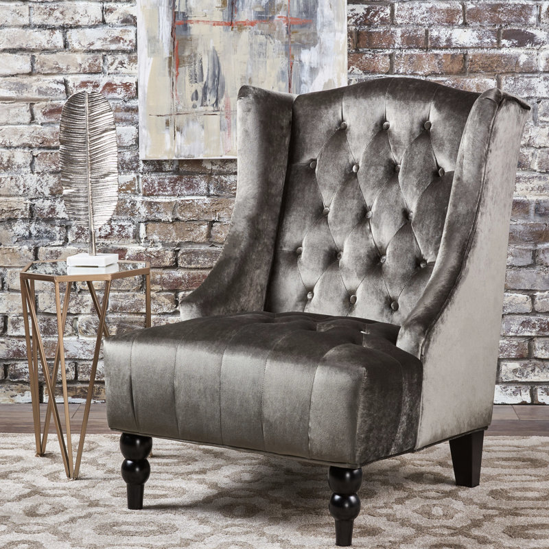 Fauteuil club Tesy, dossier haut, velours capitonné gris, pieds en bois noir