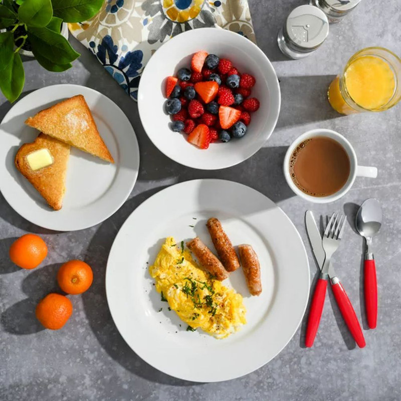Regal White 32-Piece Porcelain Dinnerware Set with Red Handle Utensils