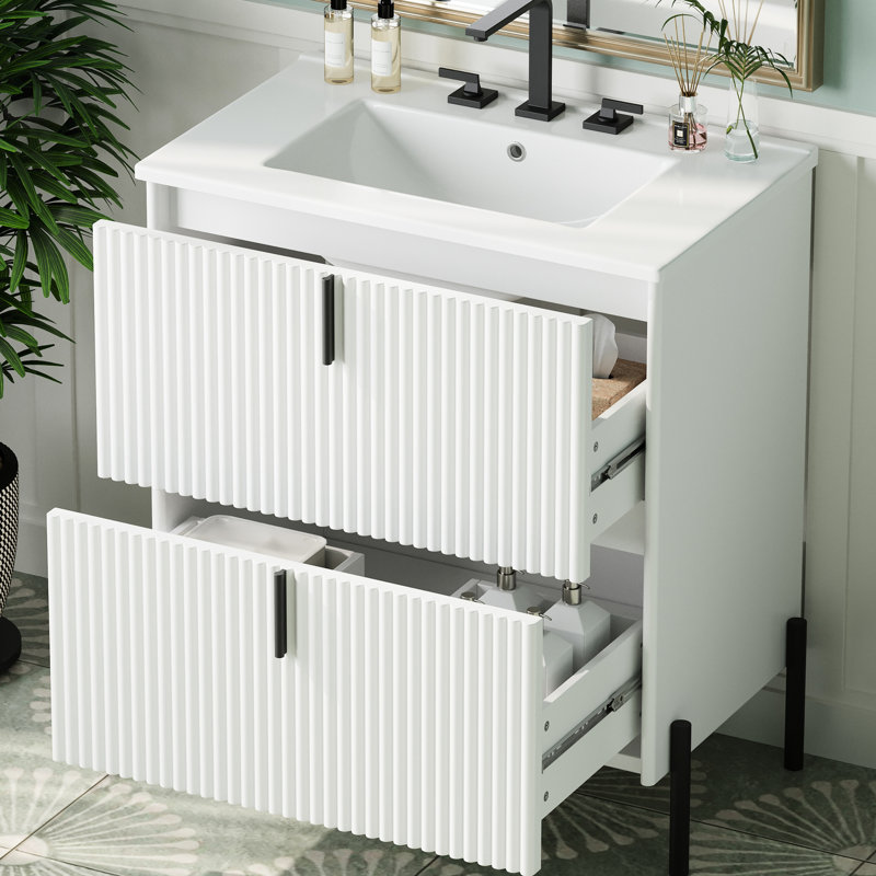 Meuble-lavabo blanc de 30 po Chevonne avec lavabo en céramique, système de tiroirs à fermeture en douceur, apparence cannelée et rangement de rangement optimal