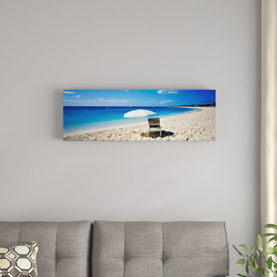 " Single Beach Chair And Umbrella On Sand, Saint Martin, French West Indies " by Panoramic Images