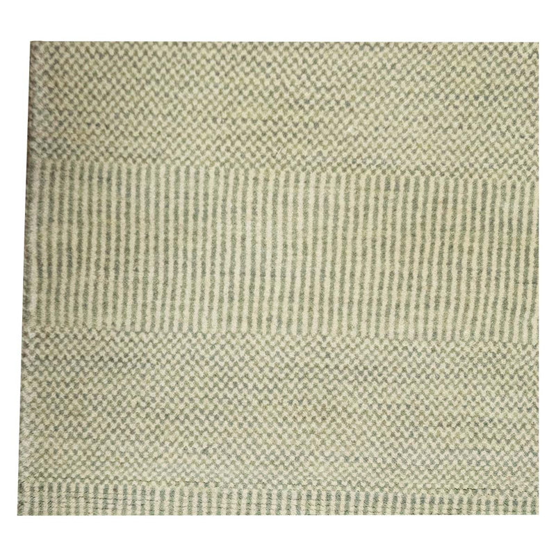 Tapis beige noué à la main