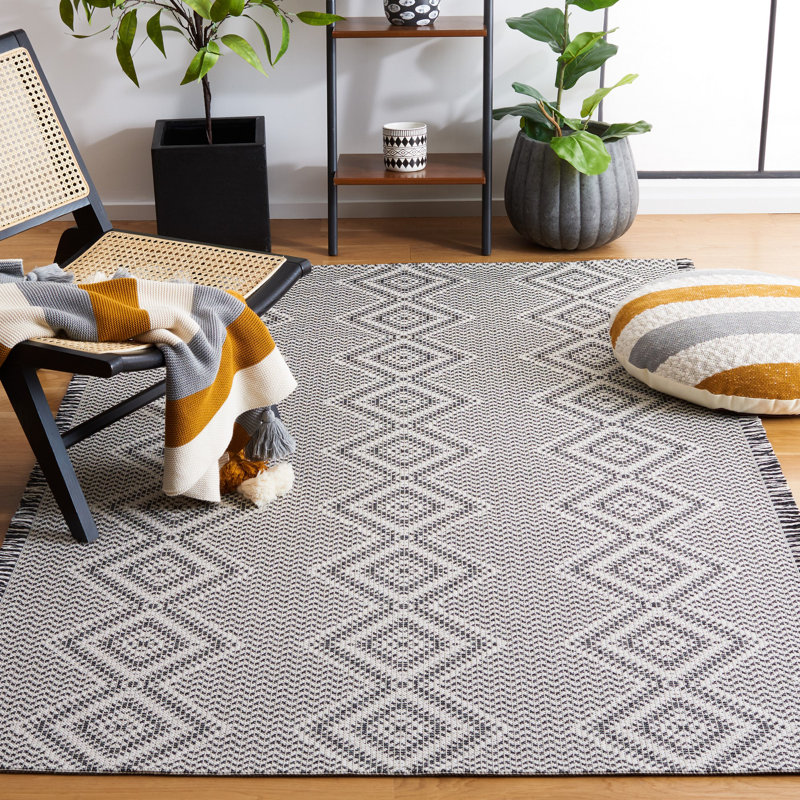 Tapis tissé à la machine de style sud-ouest Belniak en ivoire / noir, Rectangle 6 pi 4 po x 9 pi 6 po