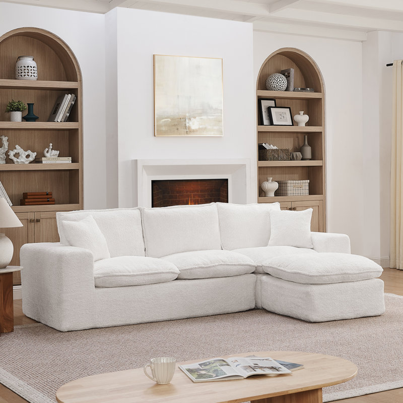 Canapé modulaire en forme de L de 107 pouces avec repose-pieds mobile Boucle, confort en forme de nuage, conception modulaire et installation sans effort pour les salons.