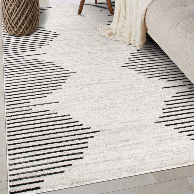 https://assets.wfcdn.com/im/61554321/resize-h755-w755%5Ecompr-r85/2162/216266157/Damarcus+Geometric+Cream%2FBlack+Area+Rug.jpg