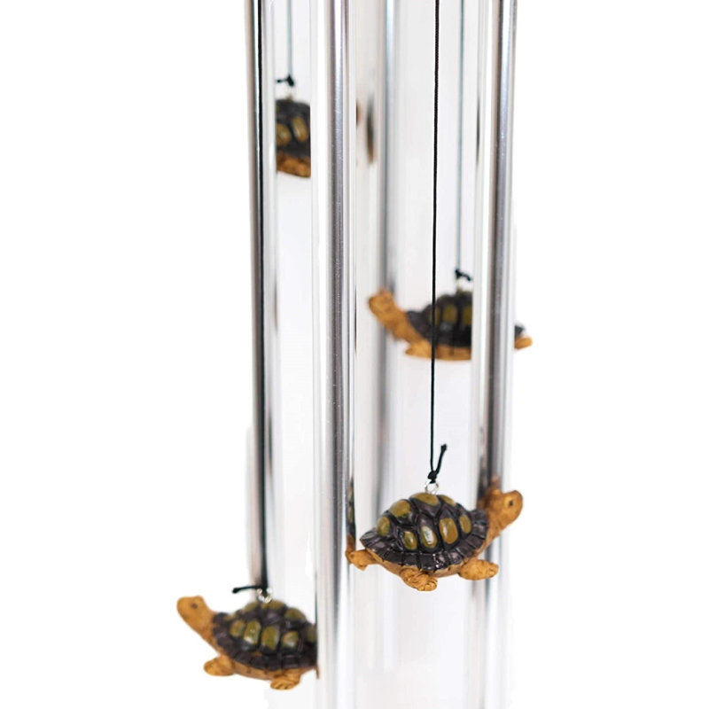 Carillon de famille de tortues géantes de grande mère piggybacking