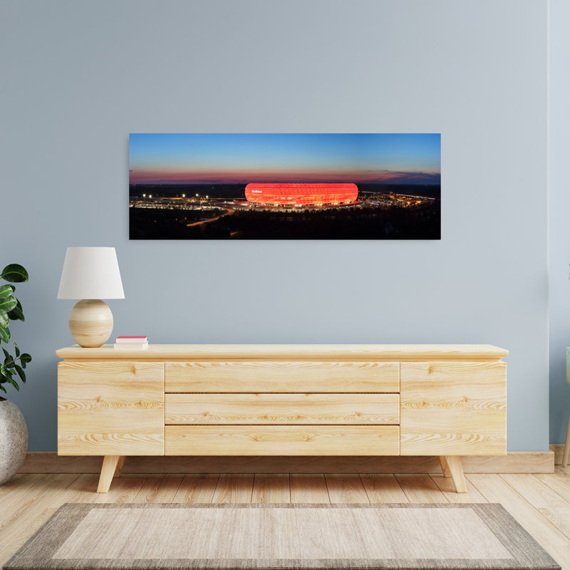 Soccer Stadium Lit Up At Dusk Allianz Arena Munich Bavaria Germany by Markus Lange - Wrapped Canvas Panoramic Print