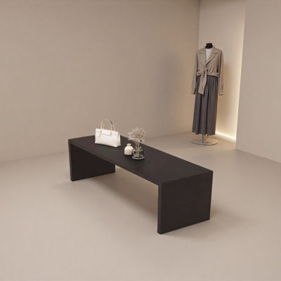 The spacious display table in the clothing store
