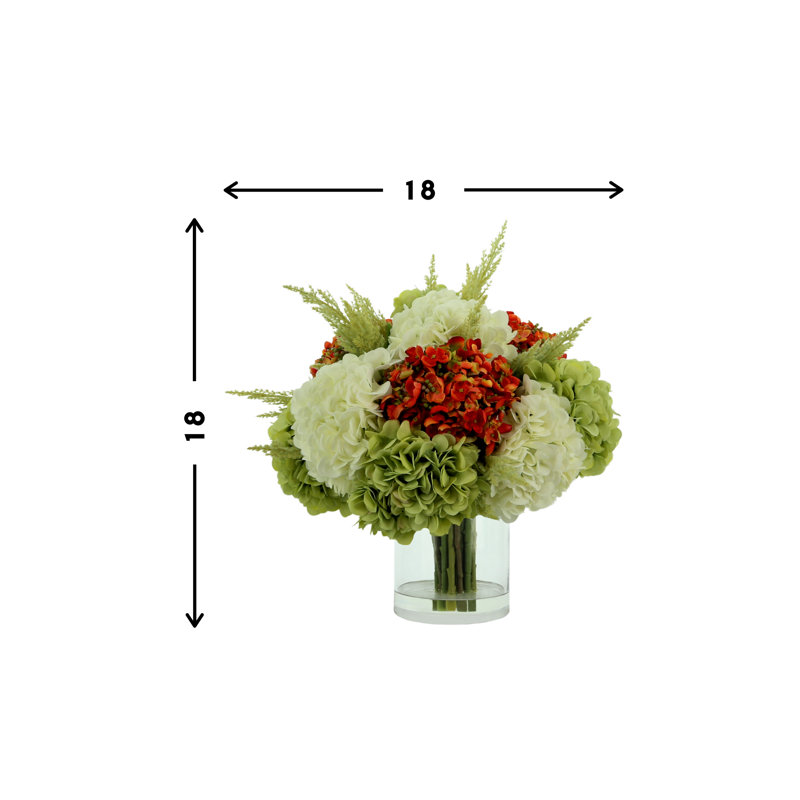 Assorted Hydrangea In A Round Vase