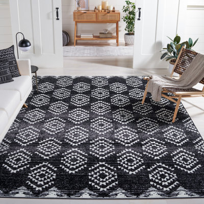 Tapis tissé géométrique noir / ivoire Gonsales