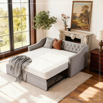 Upholstered daybed with Pop Up Trundle by Latitude Run