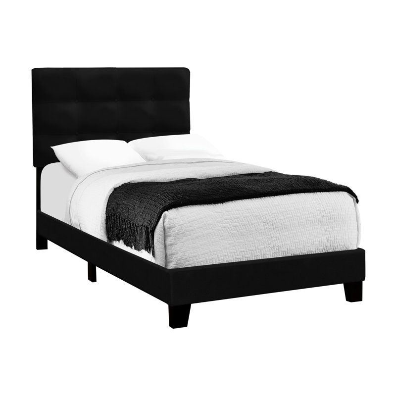 Élégant lit simple revêtu de velours noir pour le cadre transitionnel d'une chambre d'ado