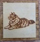 Plaque murale de chat couché