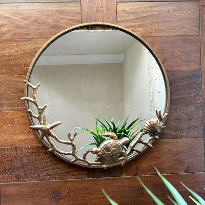 Coastal sea turtle, coral, and seashell bronze metal and glass wall mirror, 20.5-inch diameter