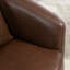 Fauteuil demi-tonneau rembourré pivotant avec rangement-1975871538
