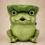 Statue de grenouille de jardin avec chapeau en feuille de lotus