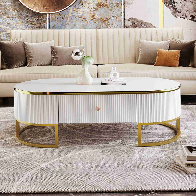 Table basse moderne ovale avec tiroirs, conception à profil incurvé, décor en métal doré, table centrale pour le salon