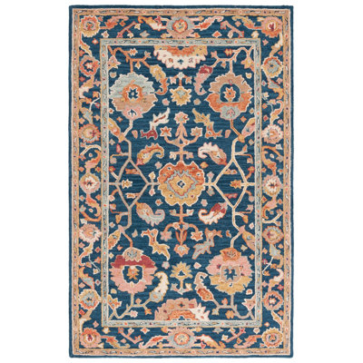 Menga Hand Tufted Wool Cotton Oriental Rug in Red/Navy