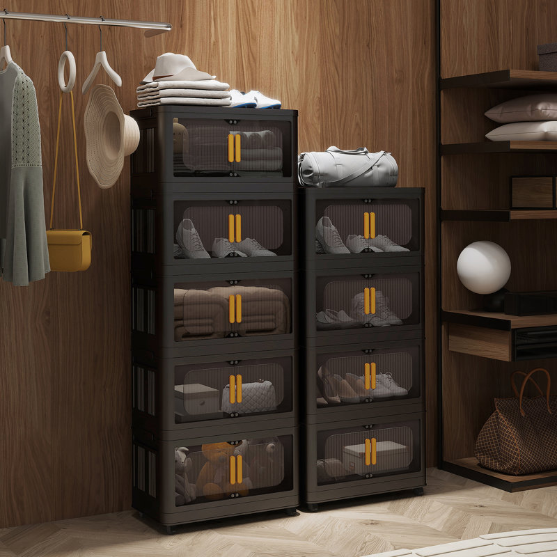 Armoire de rangement pliante polyvalente avec plusieurs niveaux, portes magnétiques, roulettes, idéale pour organiser divers espaces dans votre maison