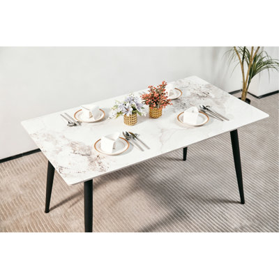 Modern Minimalist Dining Table(1.4M) With White Sintered Stone Top And Sleek Tapered Metal Legs For A Contemporary Kitchen Or Dining Room