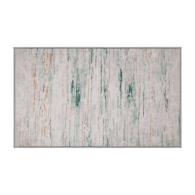 Tapis gris lavable à la machine