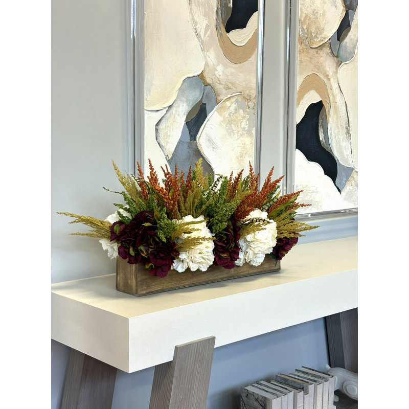 Arrangement floral hidalgo hortensias dans un panier