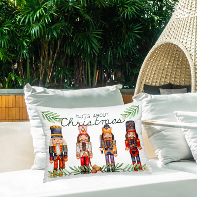 Nuts About Christmas Nutcrackers Outdoor Printed Pillow design by Kim Allen