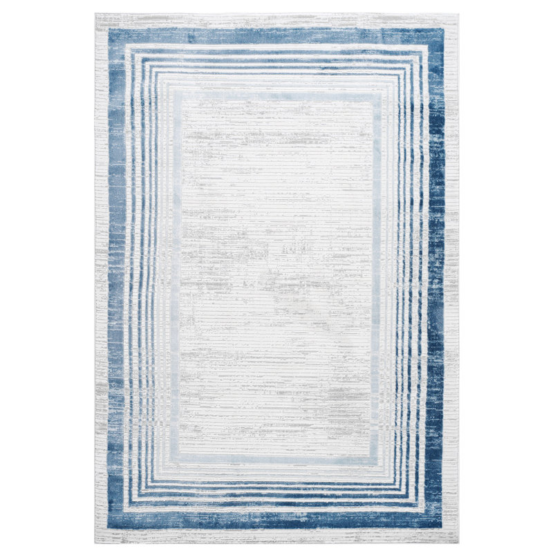 Tapis 5 x 7 bleu / ivoire / bordé