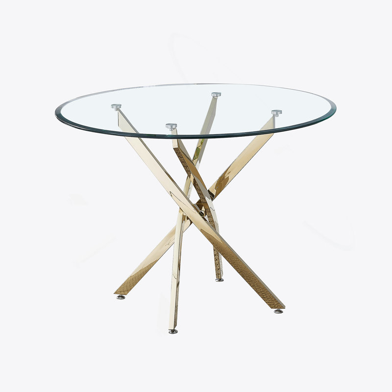 Table de salle à manger ronde en verre transparent, pieds à finition dorée