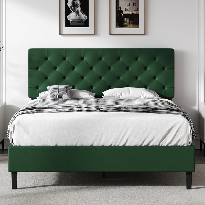 Grand lit tapissier en cuir vert