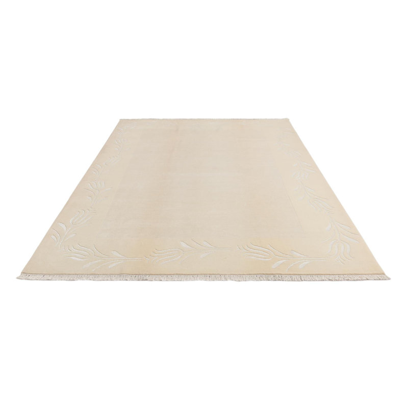 Tapis beige Iniguez