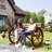 Kasandra 41" Wooden Wagon Wheel Bench, Rustic Outdoor Patio Weather Resistance Furniture, 2-Person Slatted Seat Bench with Backrest, Carbonized
