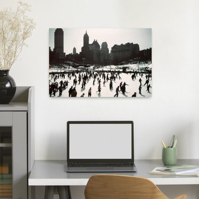 1950s LARGE NUMBER OF PEOPLE ICE SKATING ON WOLLMAN RINK CENTRAL PARK MANHATTAN NEW YORK CITY USA by H. Armstrong Roberts - Wrapped Canvas Print