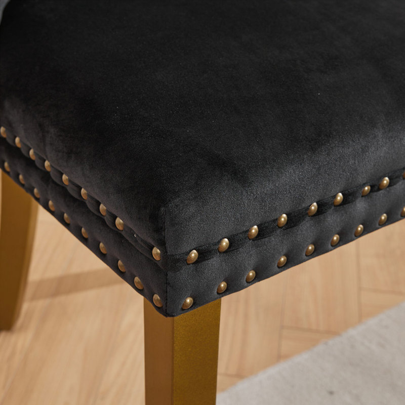 Chaise de salle à manger rembourrée en velours avec pieds cloutés en bois doré, Noir