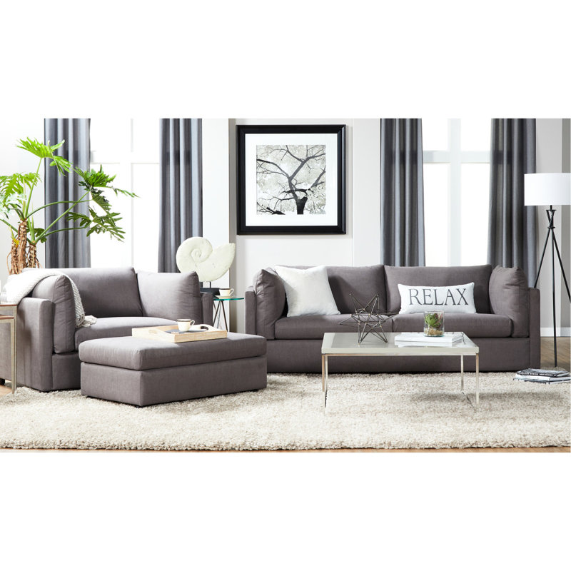 Gris carbone contemporain pour le salon - apparence élégante, siège en mousse dense, fonctionnalité polyvalente dans le style du tissu, silhouette, confort