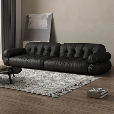 Canapé modulaire noir en similicuir