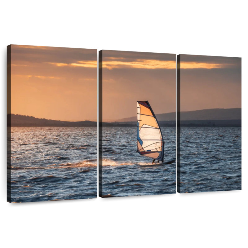 Planche à voile au coucher du soleil, H 36 po x l 57 po