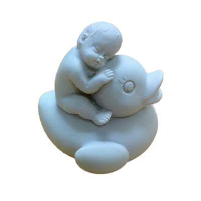 Statue baby on duck Tjure