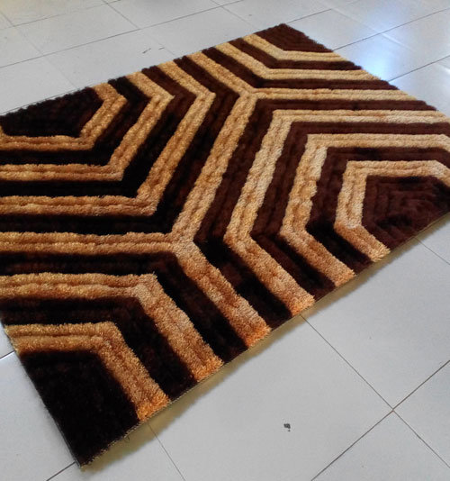 Tapis brun tissé à la machine, 5 pi 3 po x 7 pi 2 po