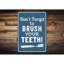 Plaque en aluminium brossant les dents-58216562