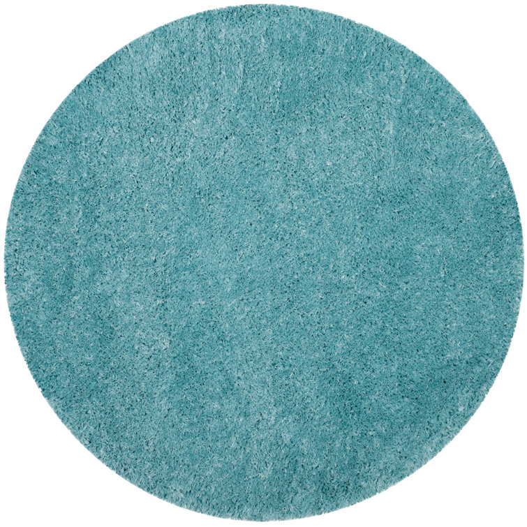 Hermina Light Turquoise Area Rug