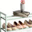 Range-chaussures en métal