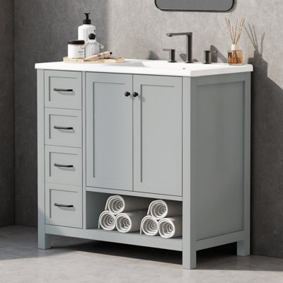 Meuble-lavabo 36 po avec lavabo droit en céramique, 2 tiroirs et 2 portes, rangement ouvert, pieds en bois massif, prêt pour le robinet à entraxe de 8 po, conception asymétrique moderne