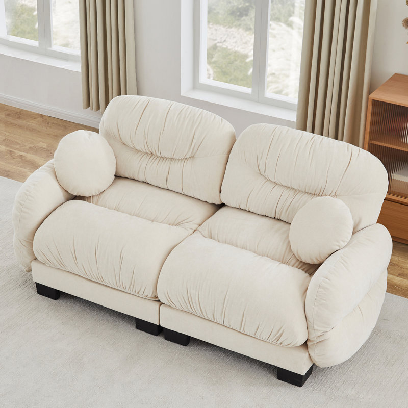 Canapé modulaire plissé en chenille 2 places avec mousse ergonomique haute densité, accoudoirs courbés et deux coussins décoratifs ronds pour un confort ultime et une disposition flexible.