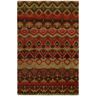 Donquell Wool Southwestern Area Rug in Red