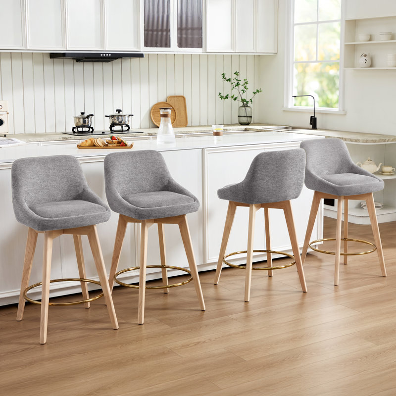 Tabourets de bar pivotants Ashwell de 26,8 po de style moderne du milieu du siècle, recouverts de lin, avec dossier incurvé, pieds en bois massif et repose-pieds en métal (ensemble de 4)