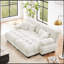 Luxueux canapé en chenille pour le salon avec plusieurs coussins et repose-pieds, améliorant le confort et le style
